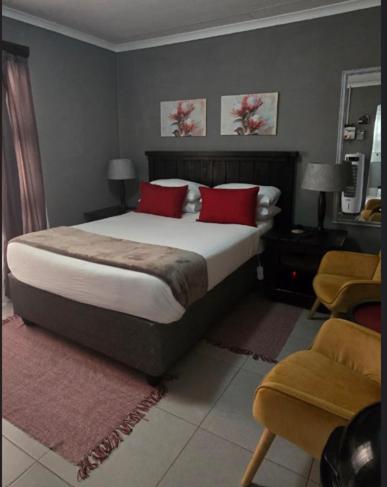 Comfortable double bedroom at Akwaaba Fie Guesthouse